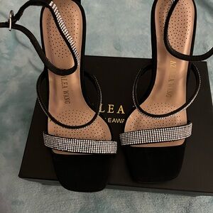 Black Strappy Heels with Rhinestones. Purchased from
Nordstrom’s 
Worn 2x